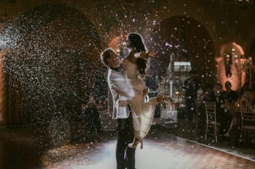 Wedding-Snow-York Wedding york DJ sets off faux snow as couple dances on empty dance floor