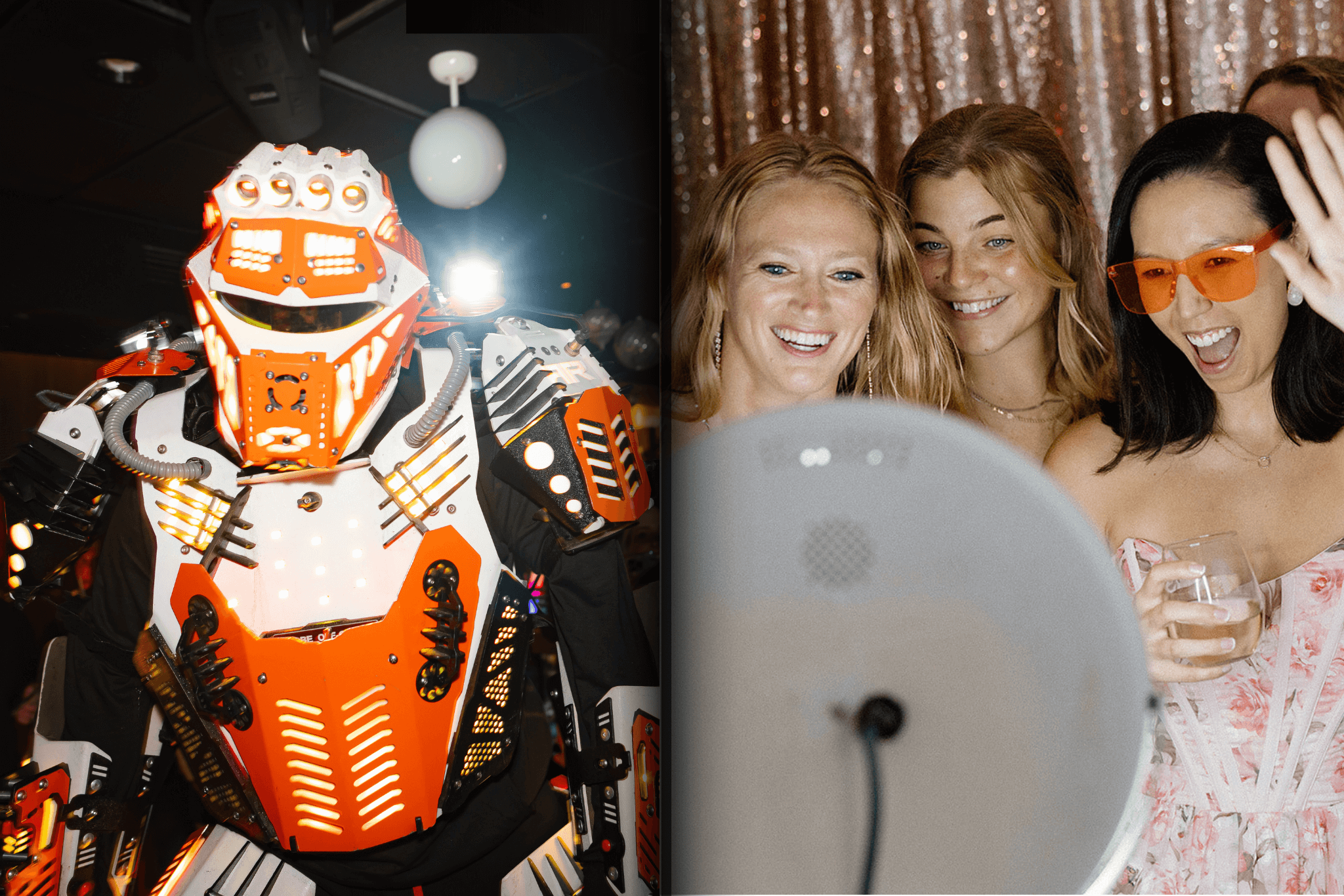 A person in an illuminated robot costume stands next to three women posing and smiling for a photo in front of a sparkly backdrop.