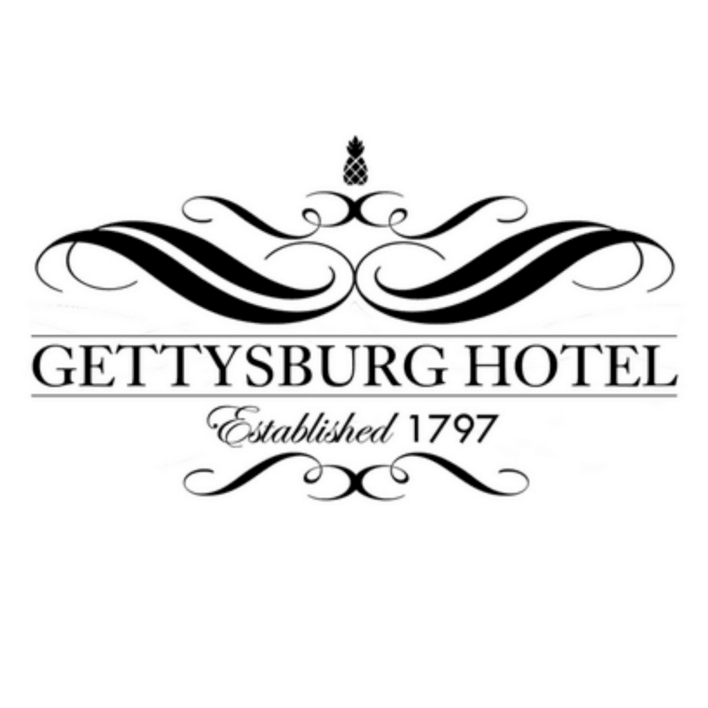 Black and white logo for Gettysburg Hotel features ornate flourishes above and below the text "Gettysburg Hotel Established 1797" with a small decorative emblem at the top.