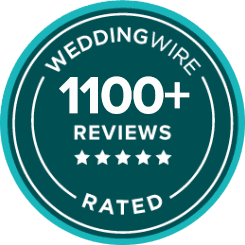 Circular badge displaying "WeddingWire Rated, 1100+ Reviews" with five stars beneath the text on a teal background.