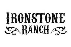 venue-logo-ironstone-ranch Text logo reading "Ironstone Ranch" in a bold, western-style font with decorative flourishes on a white background.