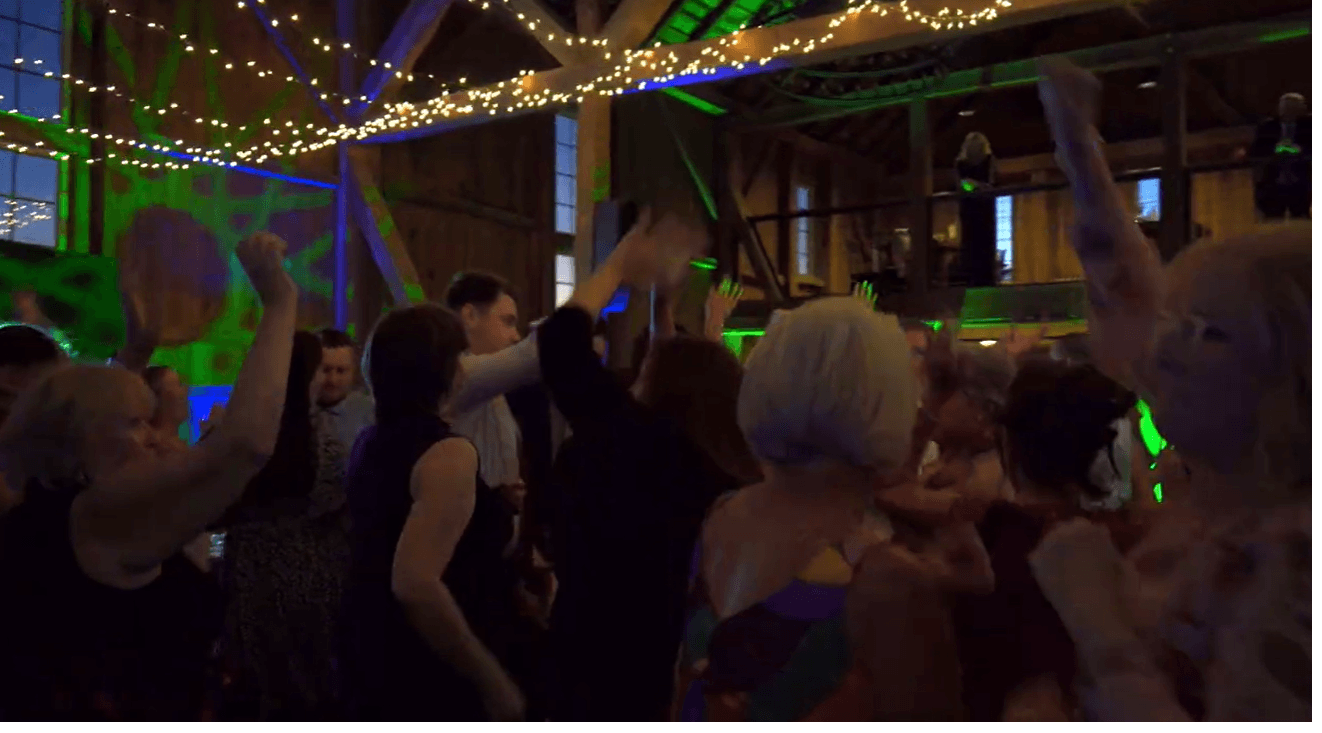 Guests dancing at Carleigh and Jack's wedding reception at Wyndridge Farm, Dallastown, PA, with DJ from Klock Entertainment